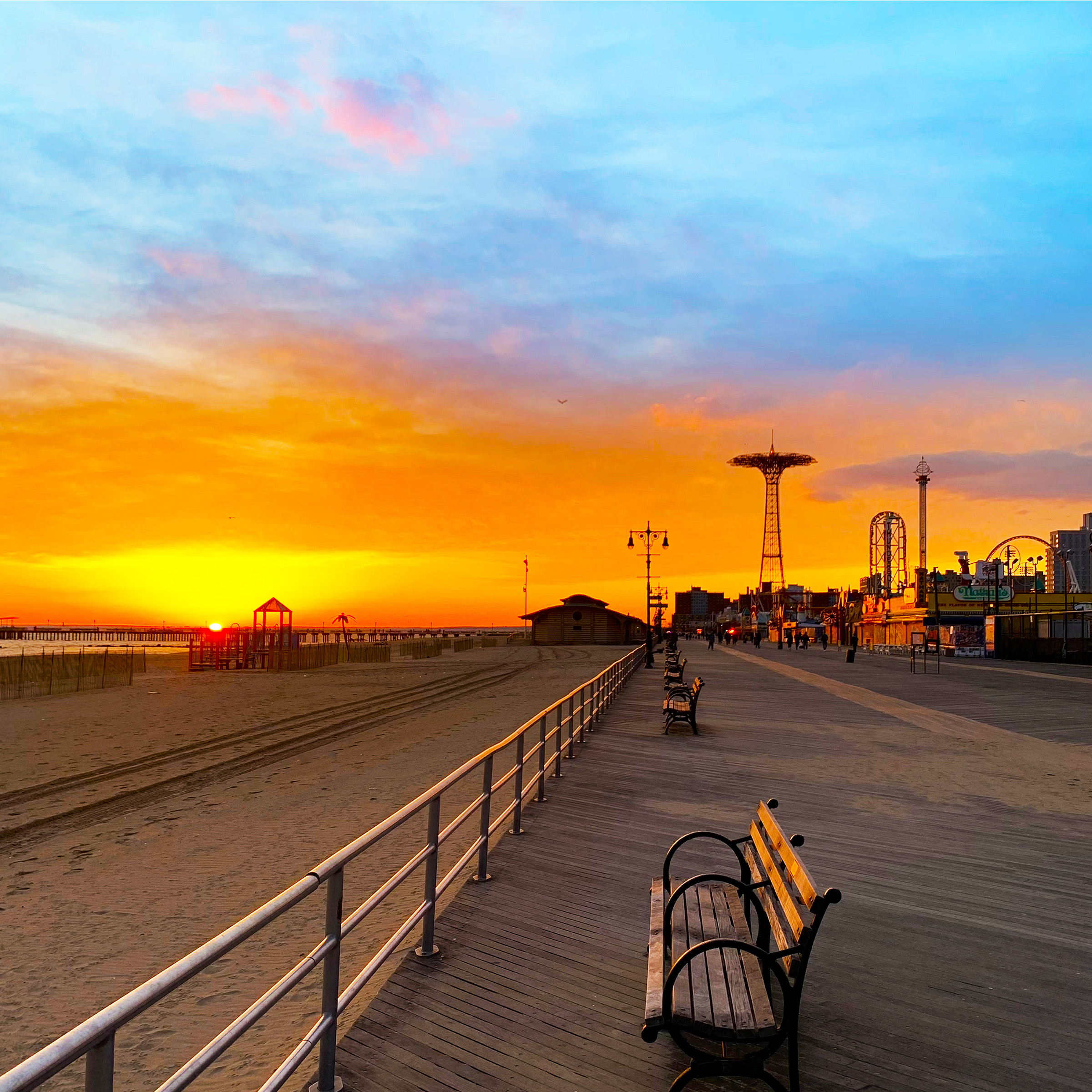 CONEY ISLAND GOLD, 16in x 16in fine art print, signed and numbered by Sebastian Wintermute. Sunset over Coney Island boardwalk.